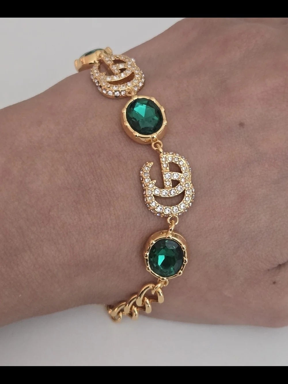 Gucci 18kgp GG Gold-Tone Bracelet with Emerald Green Crystal Accents